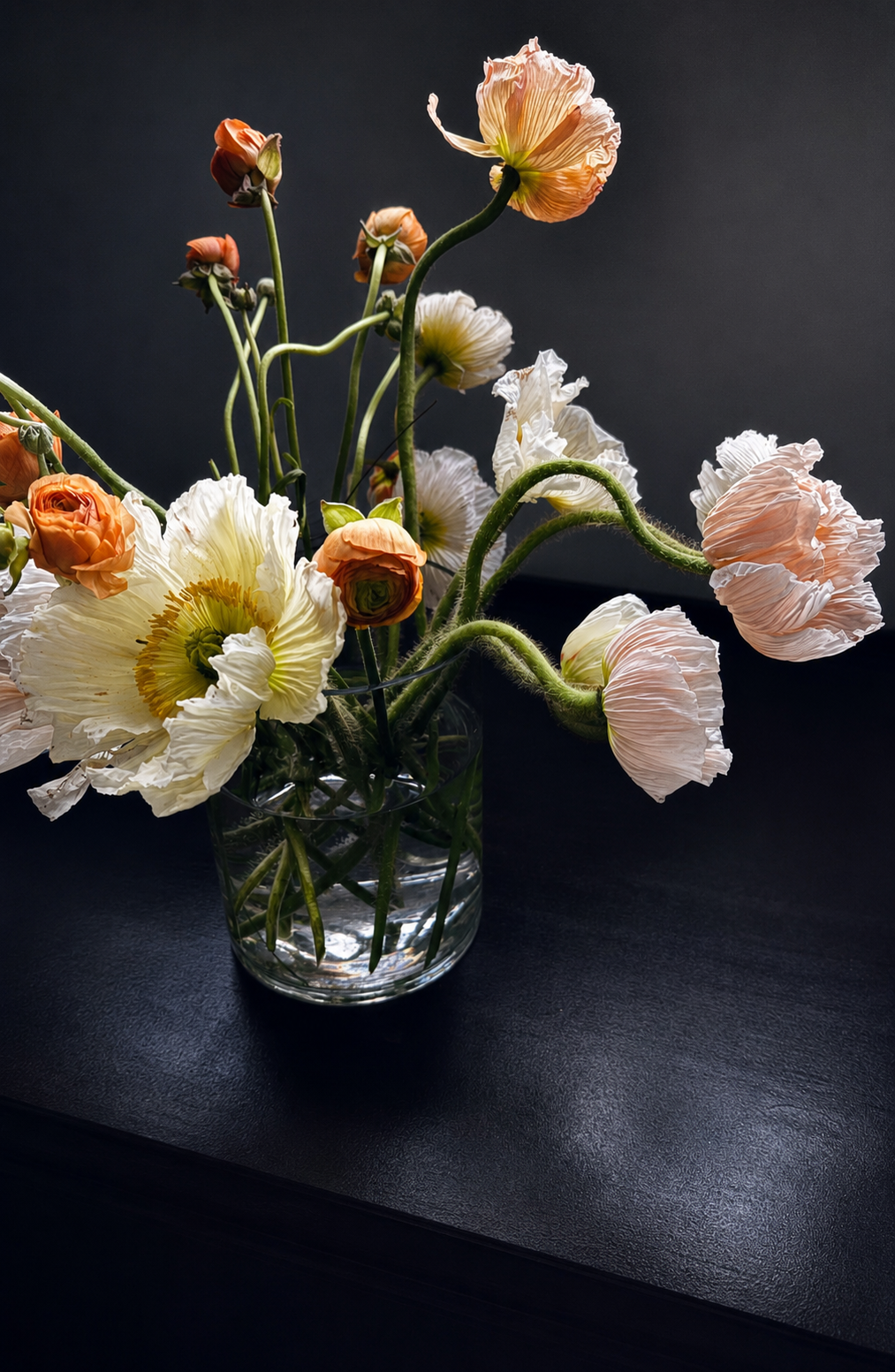 Sculptural peach and white poppy arrangement by Samantha Lee Studio
